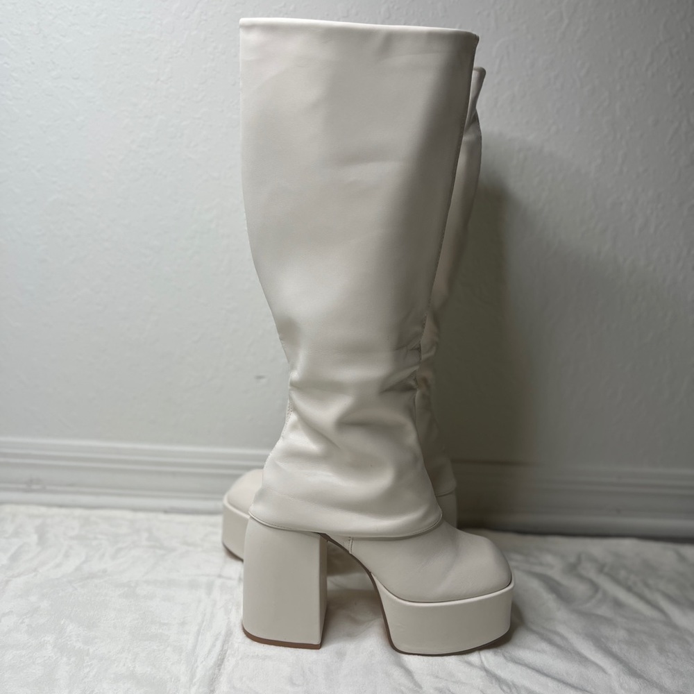 Brand new Cream EGO knee high platforms